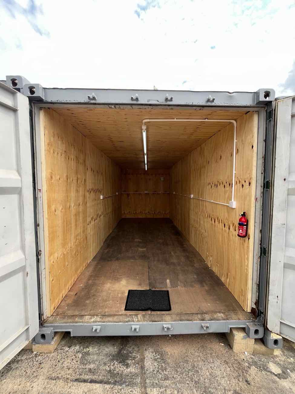 Full-length view inside a 20ft GABA unit with a clear floor